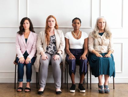 Empowering gorgeous businesswomen sitting together