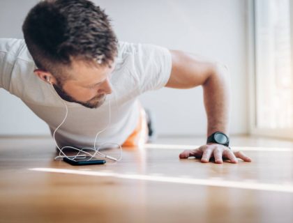 Handsome man working out at home