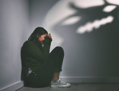 shot-of-a-young-woman-sitting-in-the-corner-of-a-d-2023-11-27-05-32-46-utc (1)