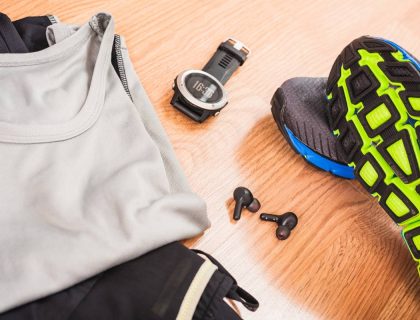 Accessories for running with wireless earbuds with an ultra trail gps watch.